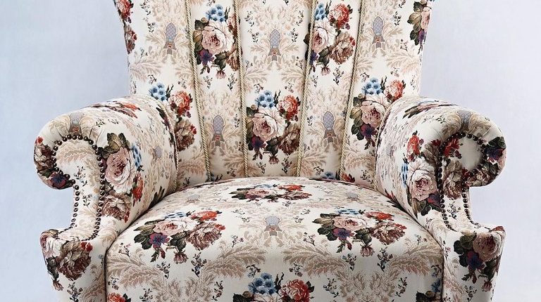 ANTIQUE WING CHAIR